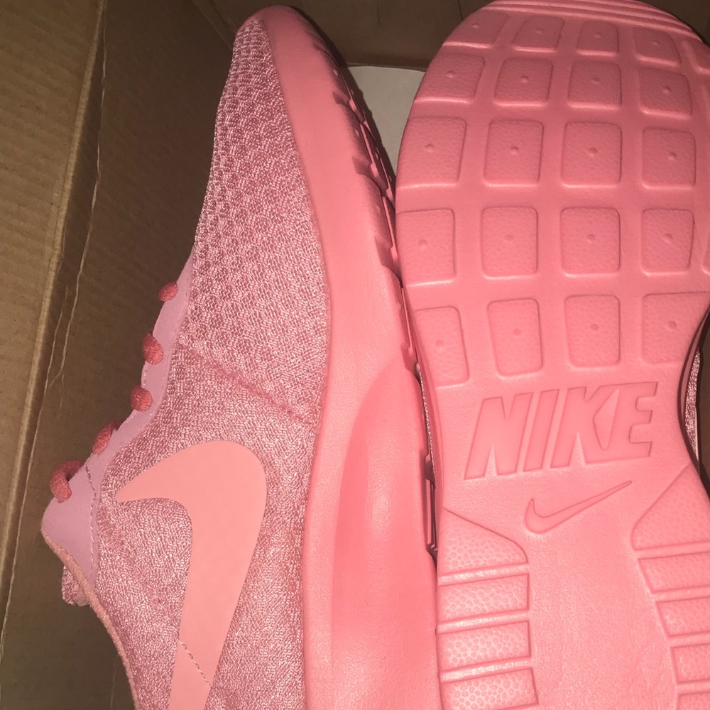 Light pink Nike Tanjun